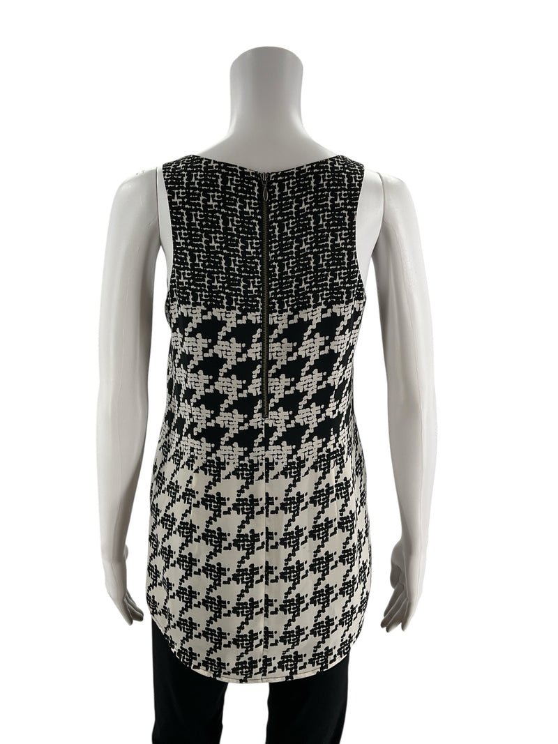 Back view of Cabi Pixel Houndstooth Tank Top Black & White Style 3090, size XS, showing full zipper and fully lined construction.