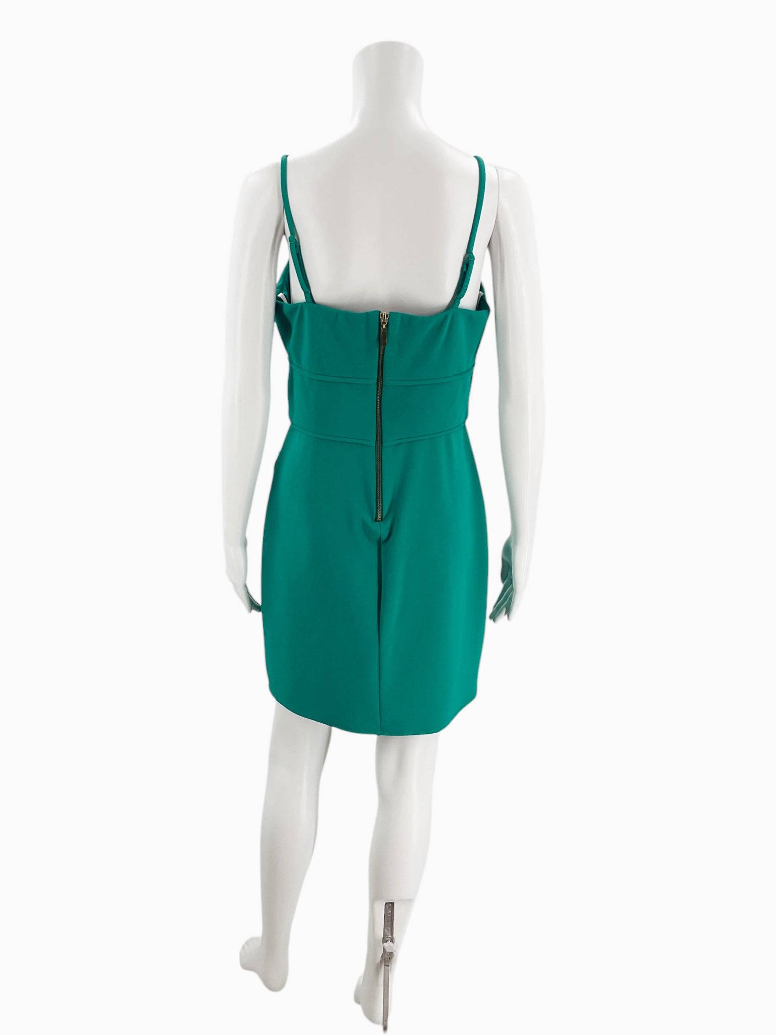 Back view of B Darlin green mini dress size 11/12 with zipper closure, featured at Margaret’s Fine Consignments for eco-friendly wardrobe updates.