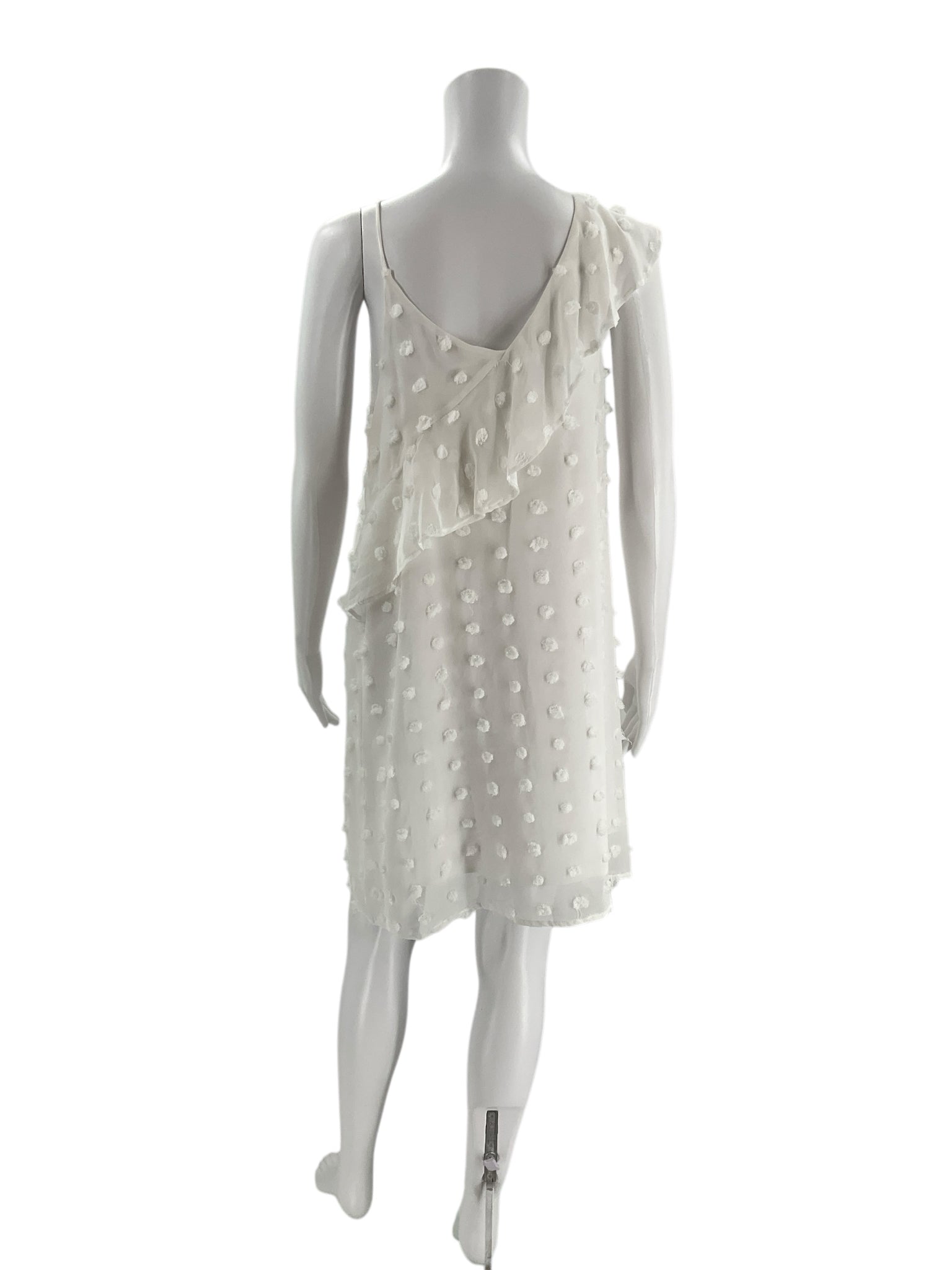 Back view of GB White Sleeveless Mini Dress Size Medium on mannequin, showing ruffle detail and lightweight fabric, perfect for warm weather.