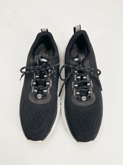Top view of Cole Haan Black Pre-Owned Ladies Sneakers Size 8 featuring lace-up design and breathable mesh for comfort and style.