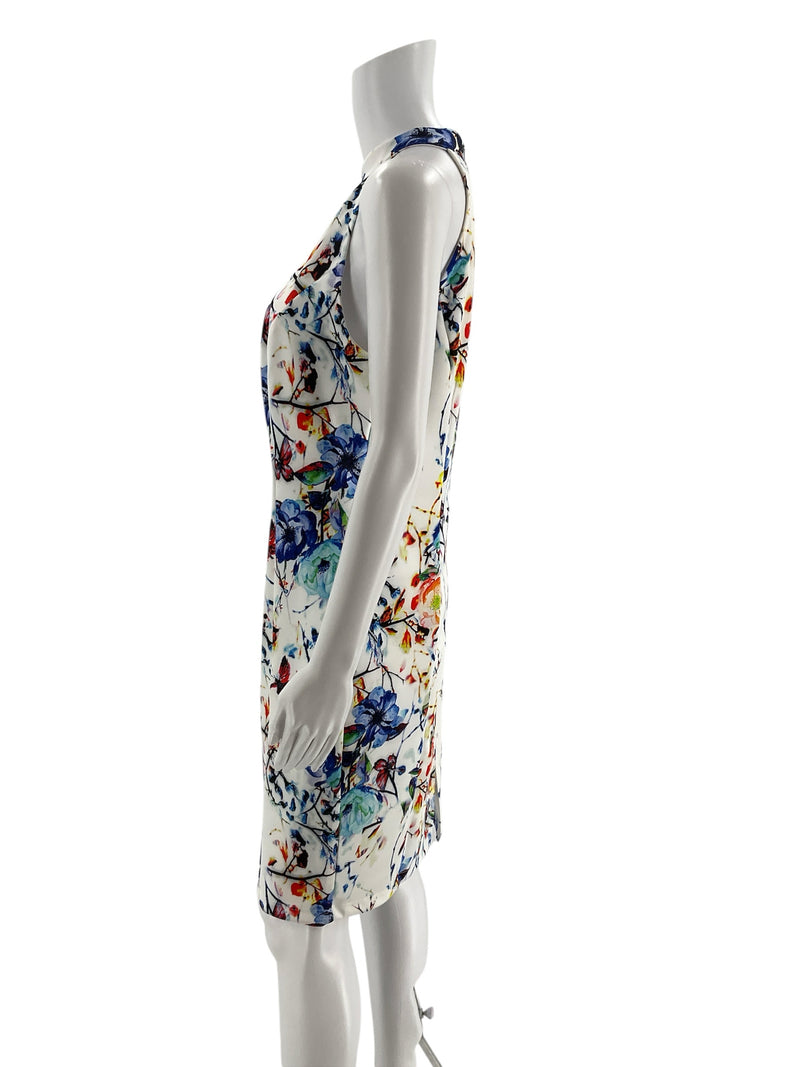 Side profile of Venus floral sheath dress on mannequin, highlighting the sleeveless halter cut and fitted silhouette.