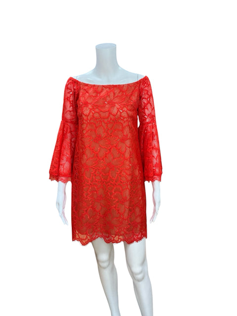 Front view of Trina Turk orangish/red lace shift dress on mannequin, featuring floral lace and bell sleeves. New with tags, size 2.