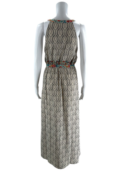 THML tan and black print sleeveless maxi dress in size small, featuring a bohemian style perfect for resort wear.
