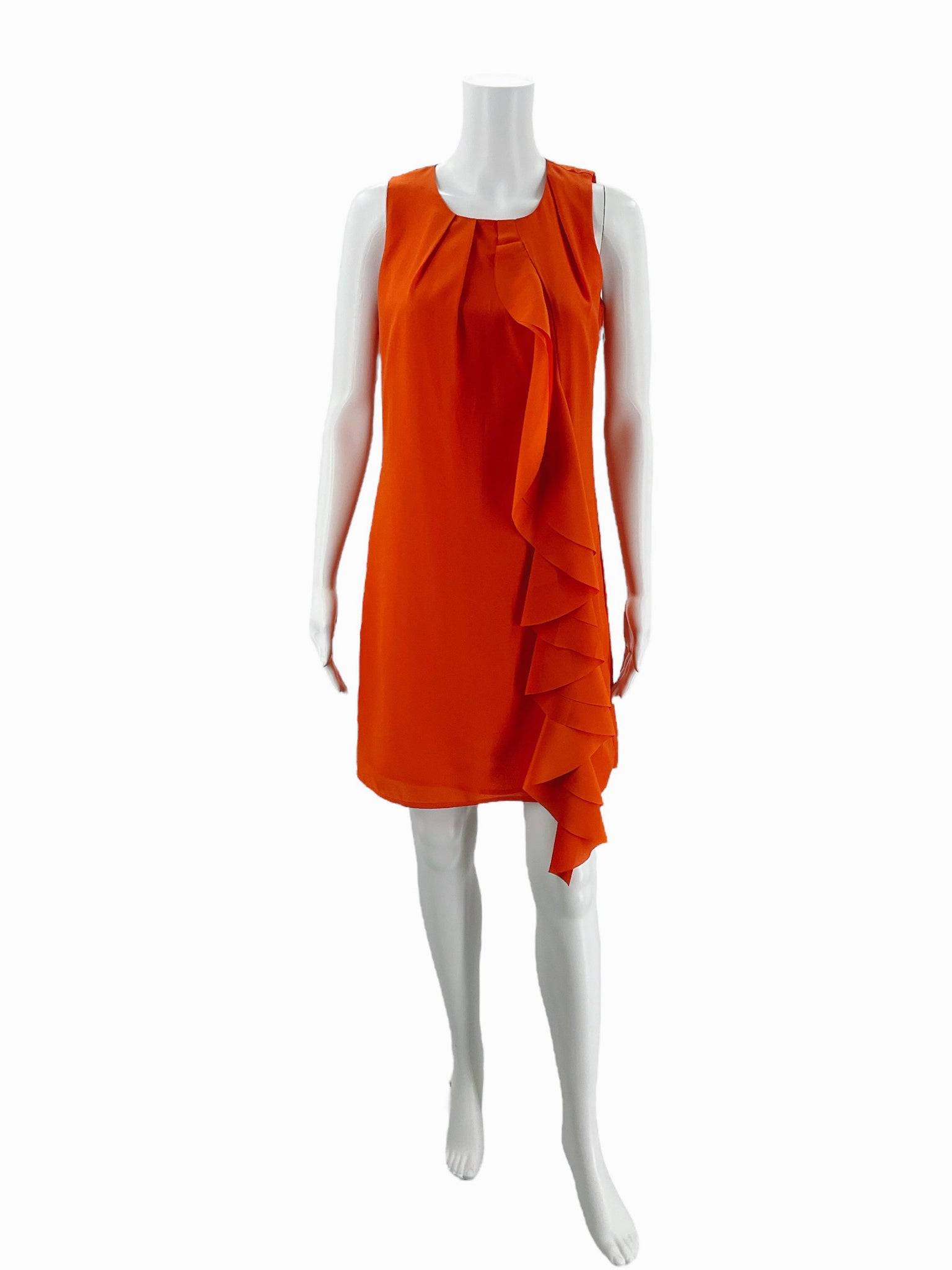 Jade orange ruffle mini dress size XS with sleeveless crew neck design and cascading front ruffle, ideal for casual or semi-formal wear.
