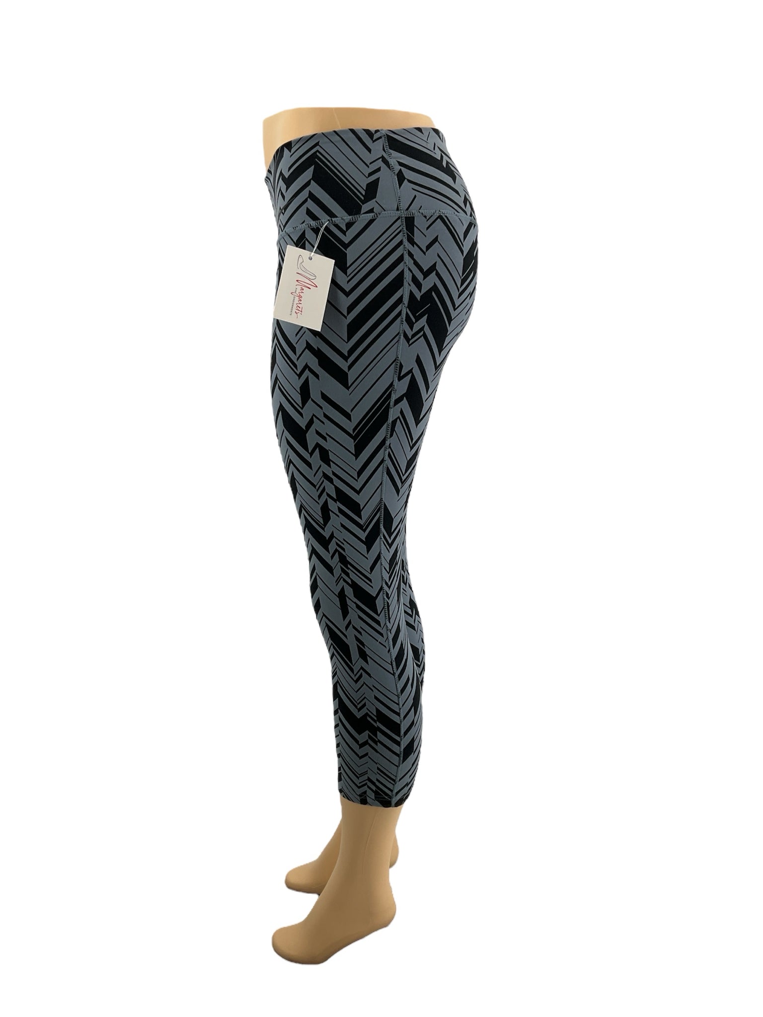 Nike blue and navy print pre-owned ladies activewear pants, size small, featuring a comfortable fit and stylish design.