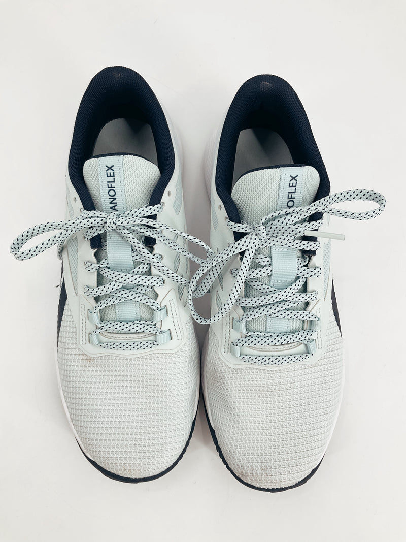 Top view of Reebok Mint/Navy Solid Pre-Owned Ladies Sneakers Size 7.5 featuring Nanoflex branding and patterned laces for added style.
