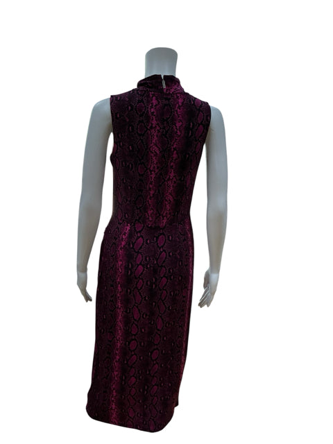 Back view of MICHAEL Michael Kors pre-owned fuchsia and black midi dress, size XS, with a sleek sheath silhouette and zip closure.
