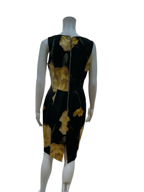 Back view of WHBM Black & Yellow Floral Sheath Dress, size 8, showing exposed zipper and back slit detail for a sleek, tailored look.