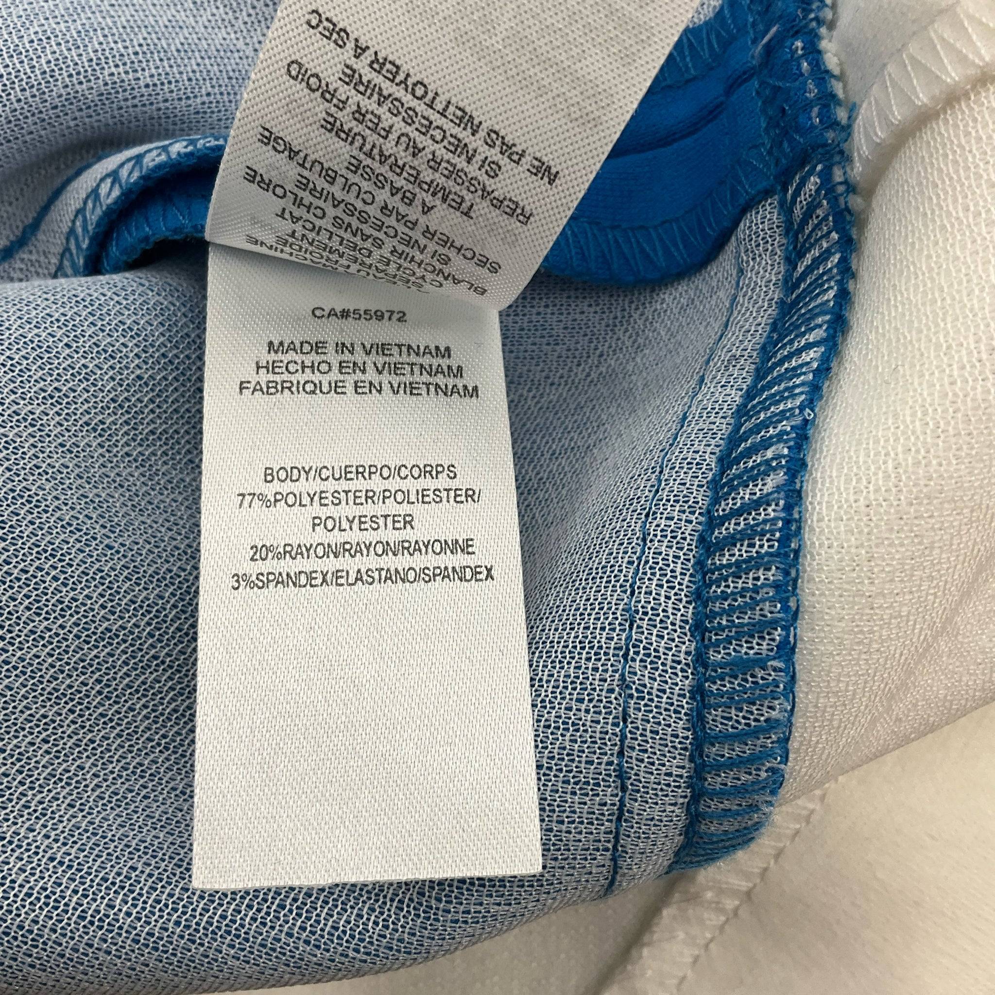 Fabric content label of Laundry Dress Size 6, detailing 77% polyester, 20% rayon, and 3% spandex blend, made in Vietnam.
