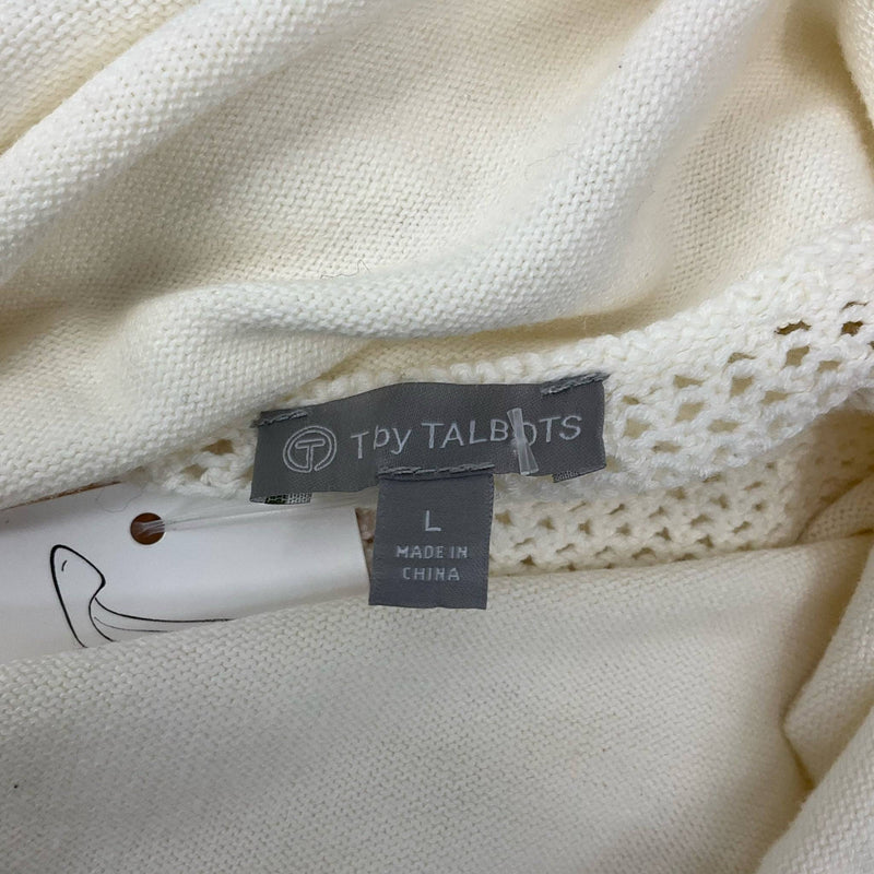 Close-up of T by Talbots brand and size tag showing Size Large, featured in cream top at Margaret’s Fine Consignments.