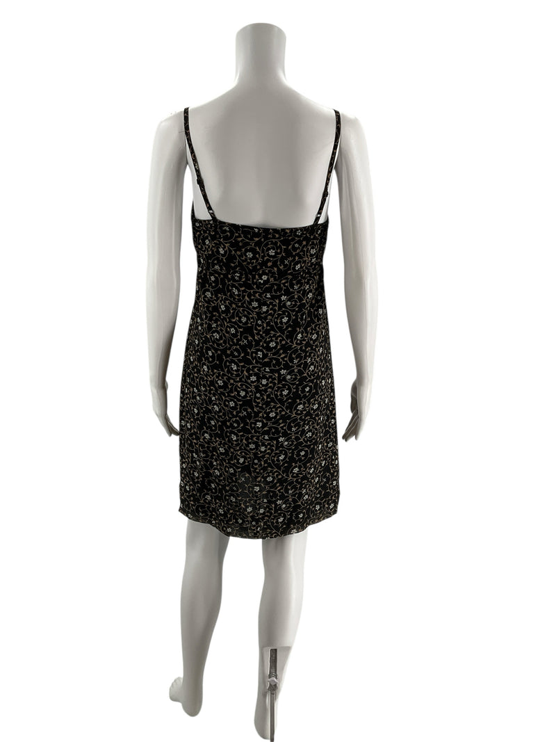 Back view of vintage Express Y2K floral slip dress in black and taupe, showing adjustable spaghetti straps and sheath fit, size 5/6.