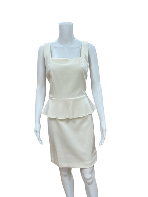Eci White Solid Sleeveless Pre-Owned Ladies Dress - Size 10 displayed on mannequin showing structured peplum design and fitted sheath silhouette.
