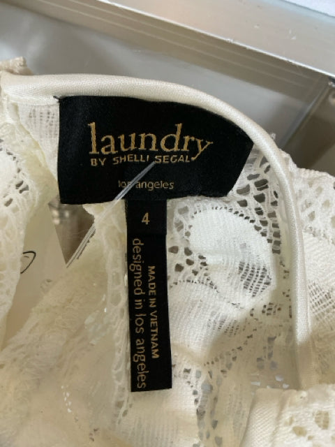 Brand and size tag of Laundry Cream Lace Pre-Owned Ladies Dress - Size 4 by Shelli Segal, made in Vietnam and designed in Los Angeles.
