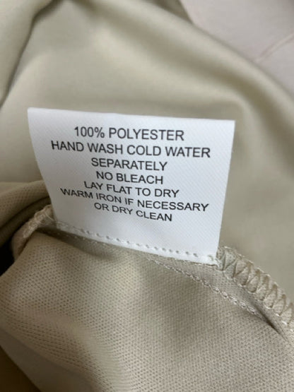 Fabric care label for Rabbit Rabbit Rabbit Beige Dress, 100% polyester, hand wash cold, lay flat to dry, size 6, sustainable fashion option.
