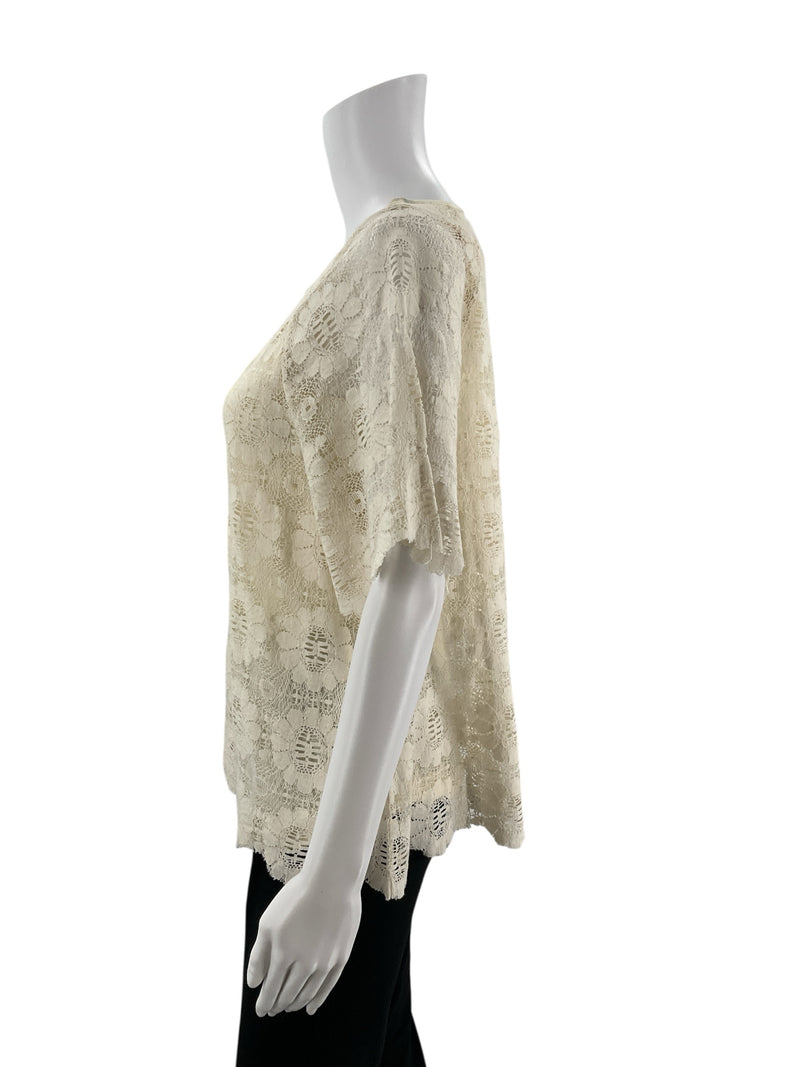 Side profile of Lilla P Cream Lace Pre-Owned Ladies Top - Size XS on mannequin, highlighting short sleeves and breathable lace fabric.