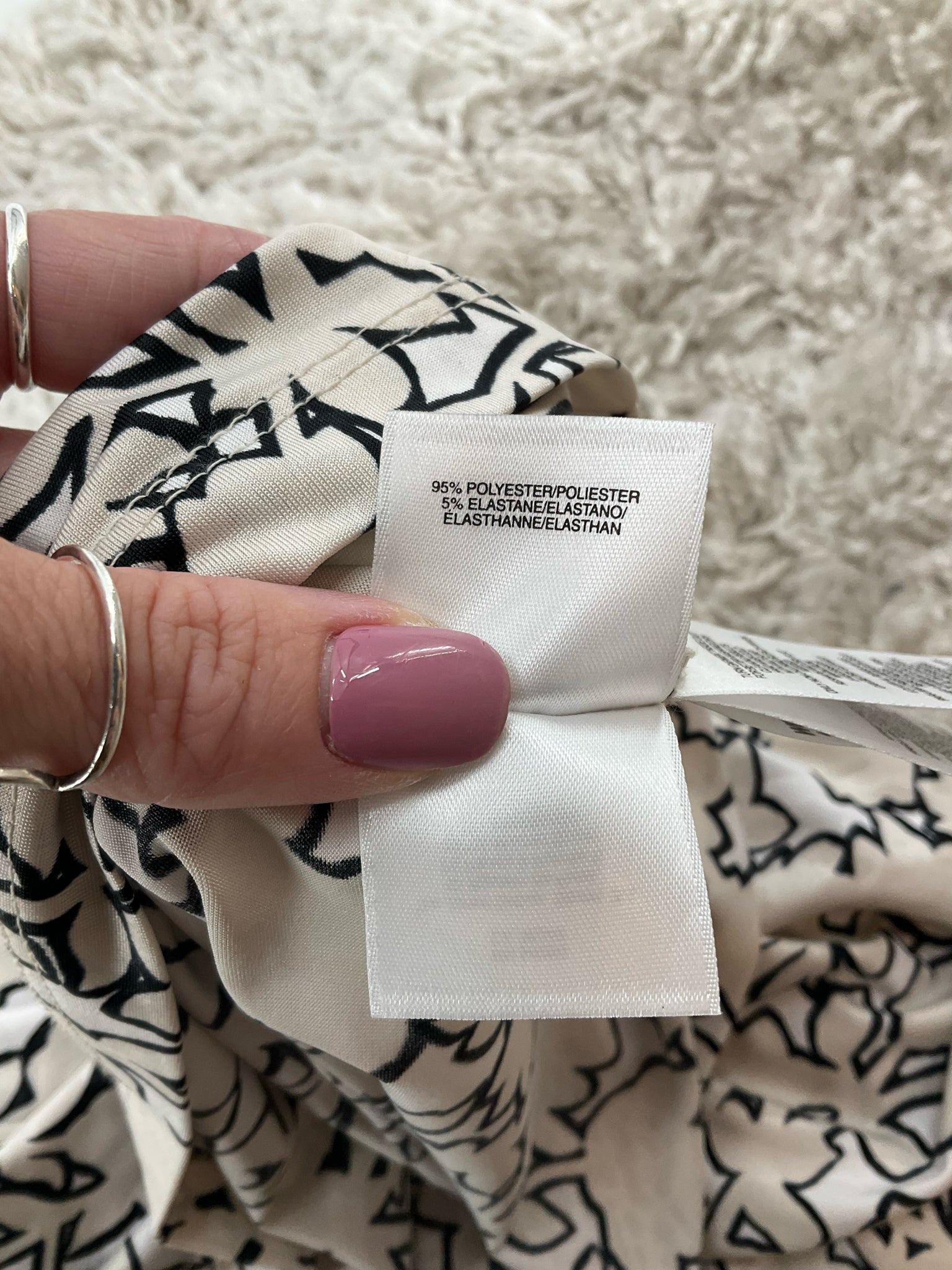 Jones New York sleeveless tie-neck blouse in tan and white print, V-neck, size petite large, perfect for business casual wear.