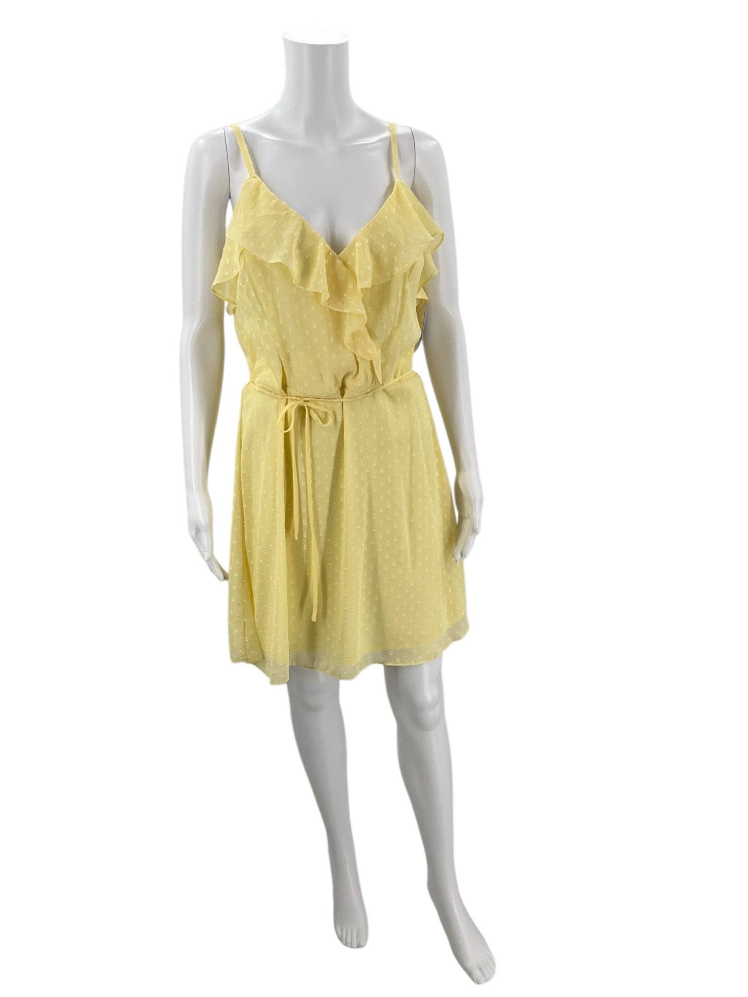 BCX yellow textured spaghetti strap mini dress size large with ruffle neckline and waist tie, available at Margaret’s Fine Consignments.