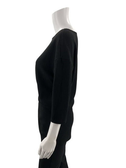 Vince Camuto black pre-owned ladies top, boat neck with twist front and drop shoulder, size small, casual and business casual style.