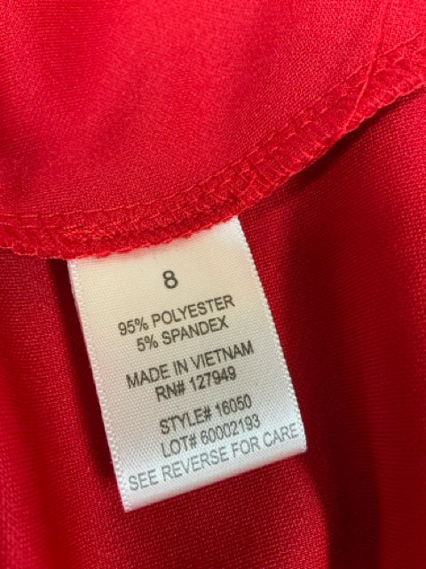 Close-up of fabric tag showing Emma Michele red dress is 95% polyester and 5% spandex, style 16050, size 8.