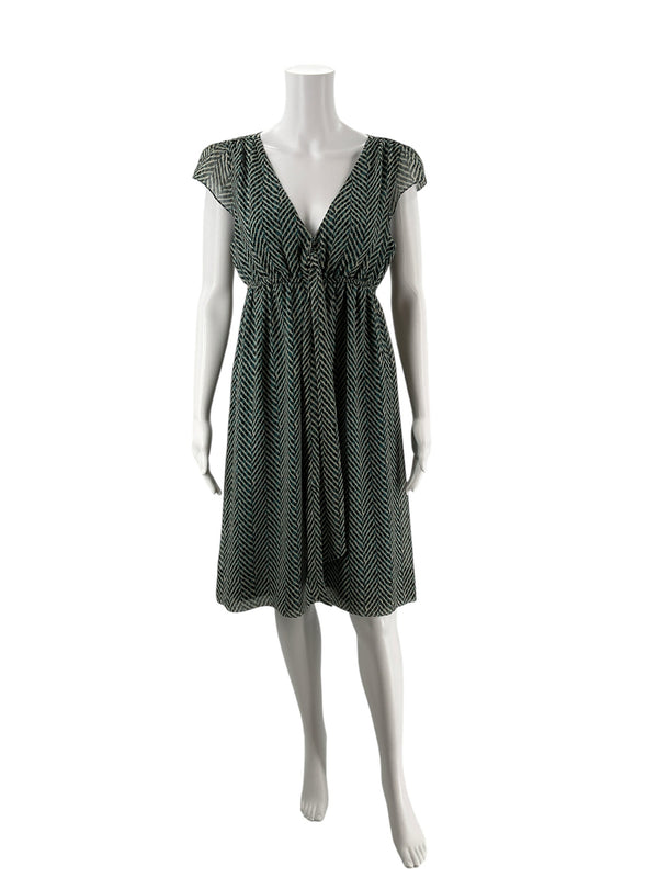 Pre-owned New York & Co size 10 teal/cream A-line dress displayed on mannequin, featuring V-neckline and lightweight chiffon fabric.