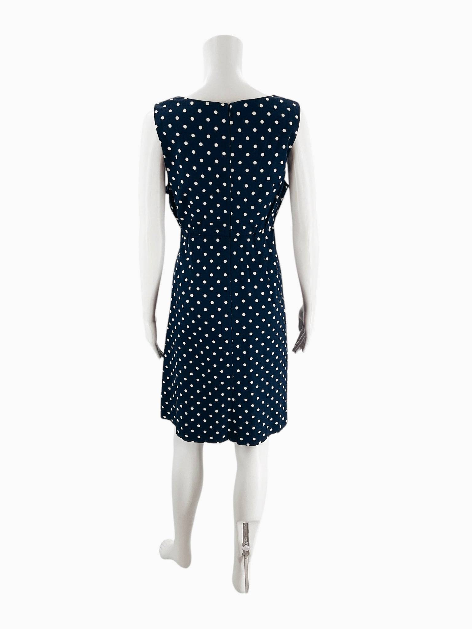 Back view of Jessica Howard sleeveless navy and white polka dot mini dress size 12, featuring a zip closure, Margaret’s Fine Consignments.