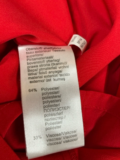 Close-up of fabric content tag on Venus Red Solid Pre-Owned Ladies Dress - Size 10, showing polyester and viscose blend composition.
