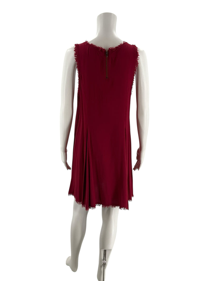 Back view of Altar'd State burgundy swing dress with visible zipper closure and raw fringe hem, ideal for casual or festival wear.