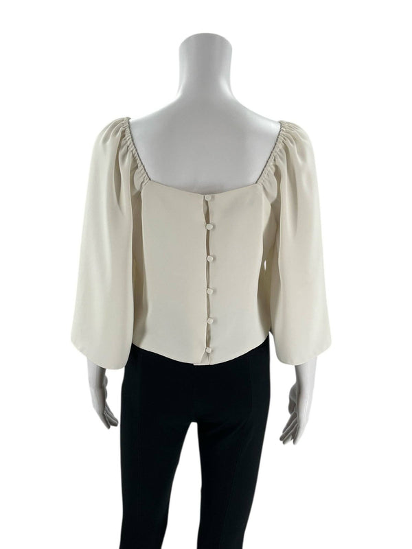 Back view of Antonio Melani Cream Solid Top - Size XS featuring button-down closure and elegant draped sleeves. Pre-owned, stylish and versatile.