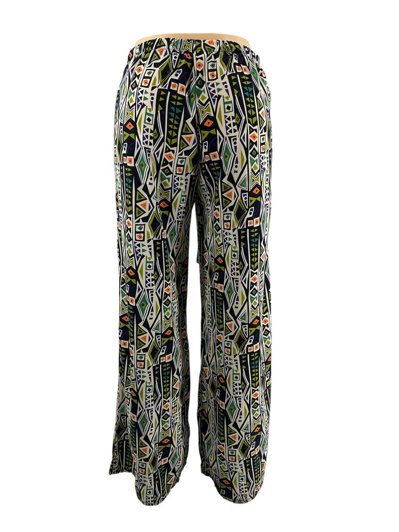 Back view of Karlie Cream/Black/Blue Print Pre-Owned Pants, size 6, featuring flowy wide-leg fit and colorful tribal geometric design.