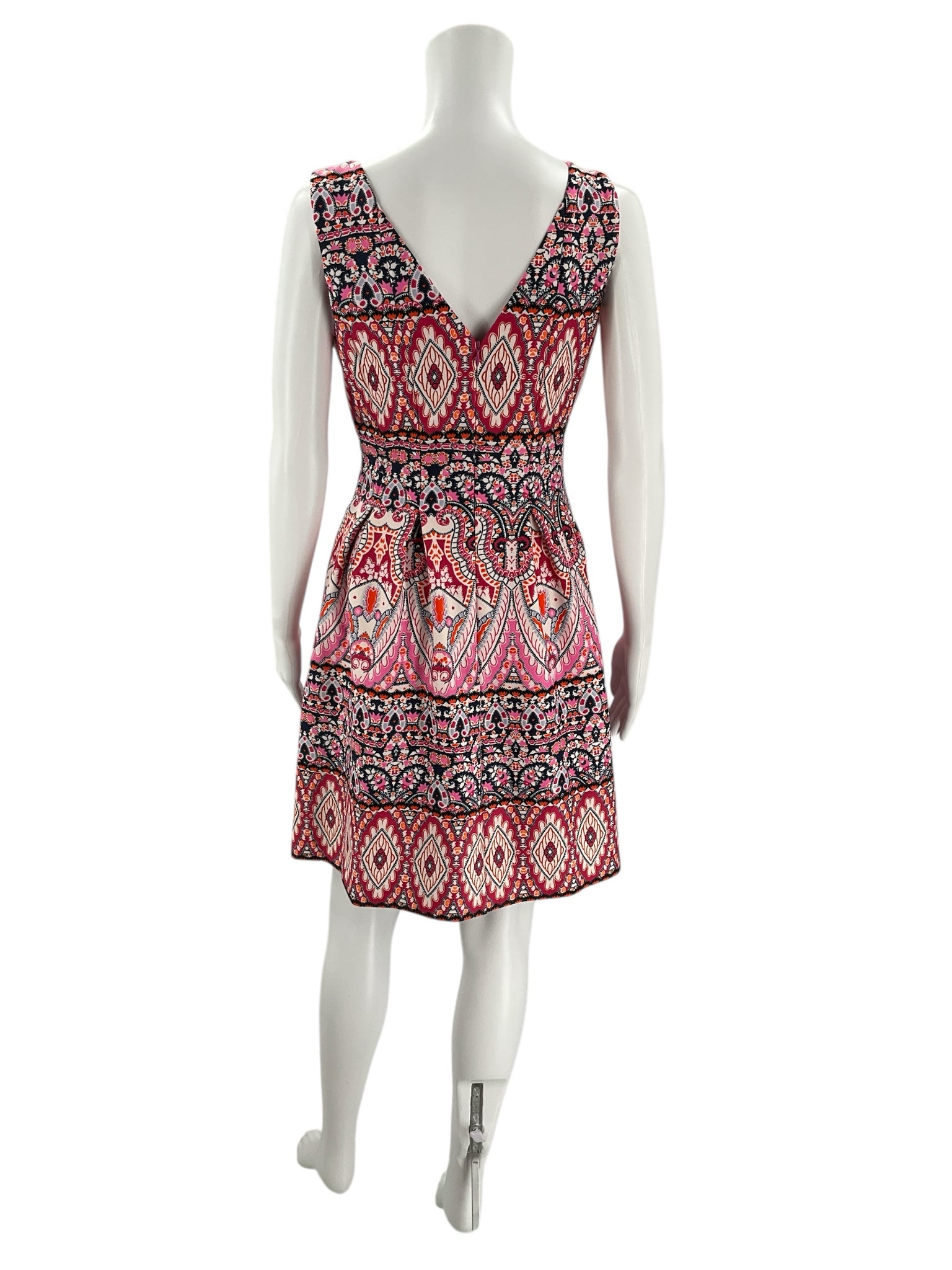 Back view of Vince Camuto Pink/Navy/Orange Print Dress - Size 4 showing deep V-back and colorful geometric and floral patterns. Gently used condition.