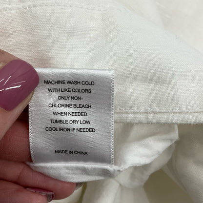 High-waisted, cuffed, pleated white shorts for women by a loves a, perfect for casual resort wear. Size 2.