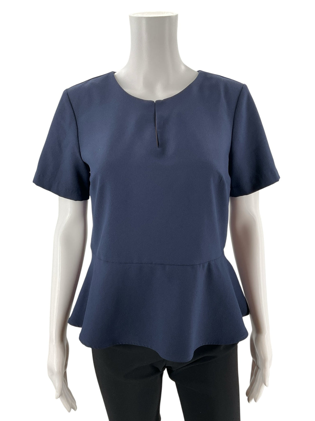 Navy solid peplum top by Banana Republic, pre-owned, size petite small, perfect for business casual minimalist style.