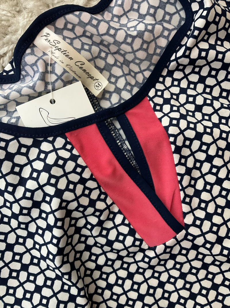 Close-up of neckline on Perception Concept Navy/White Print Pre-Owned Ladies Dress - Size Medium showing coral and navy trim with keyhole detail.