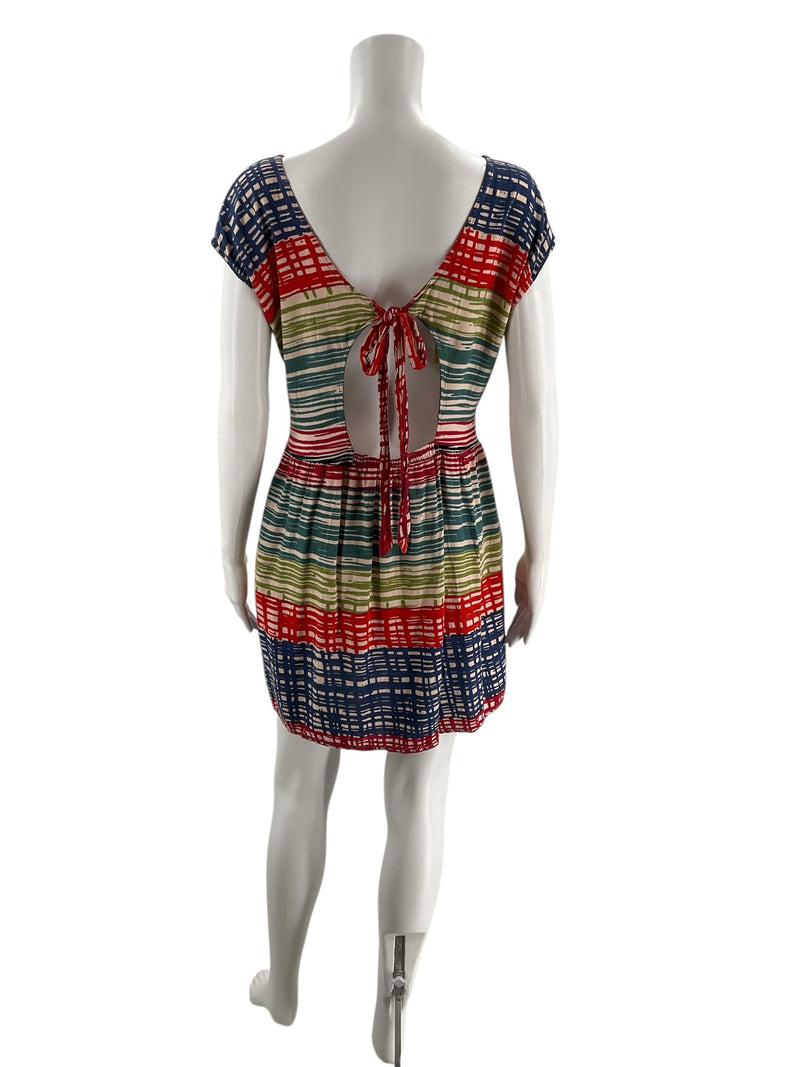 Back view of Angie Tan/Multi Print Pre-Owned Ladies Dress - Size Large with open V-back and tie detail, perfect for festival and casual outfits.