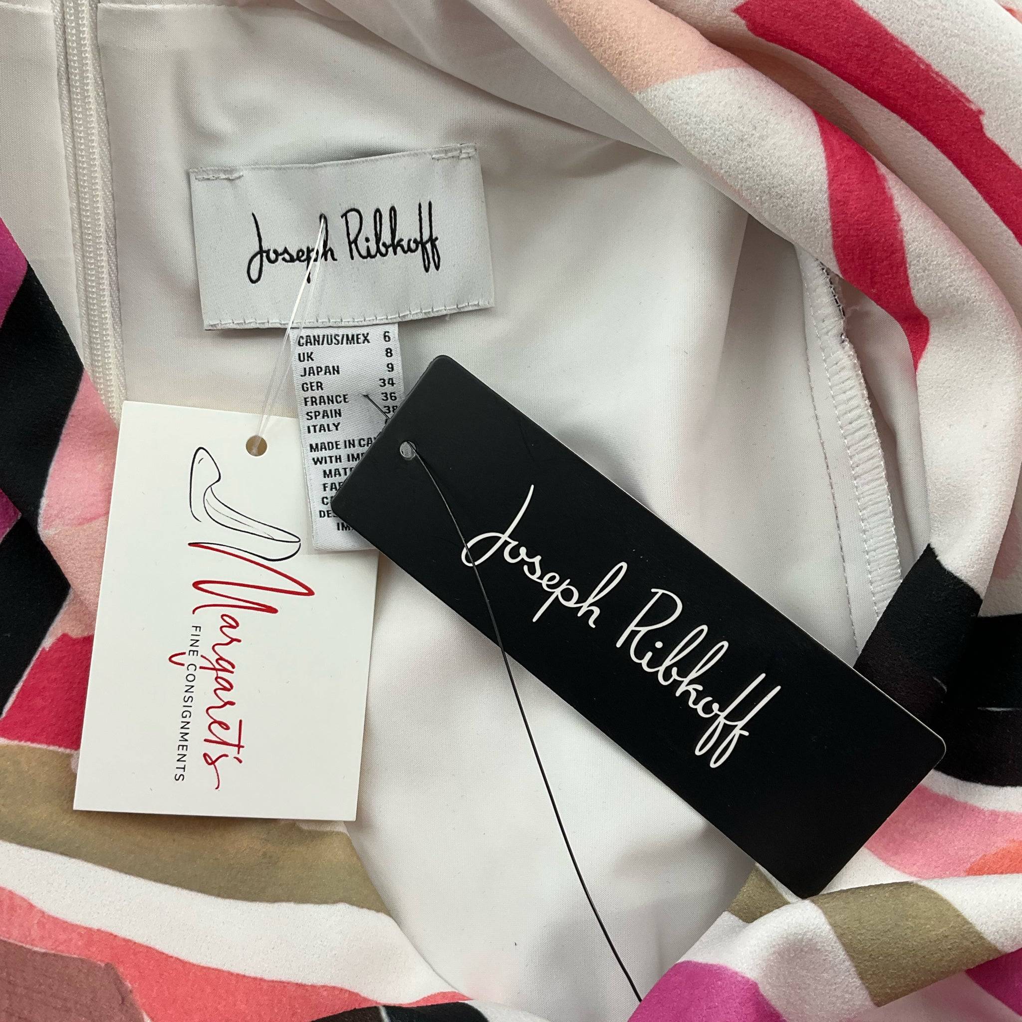 Close-up of Joseph Ribkoff and Margaret’s Fine Consignments tags on new pink and white print dress size 6, sustainable fashion option.