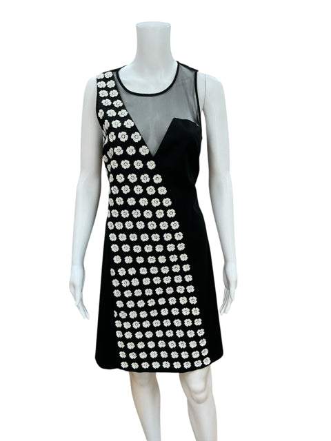 Sachin & Babi Black/White Floral Pre-Owned Ladies Dress - Size 8 displayed on mannequin showing sleeveless fit and flare cocktail style.