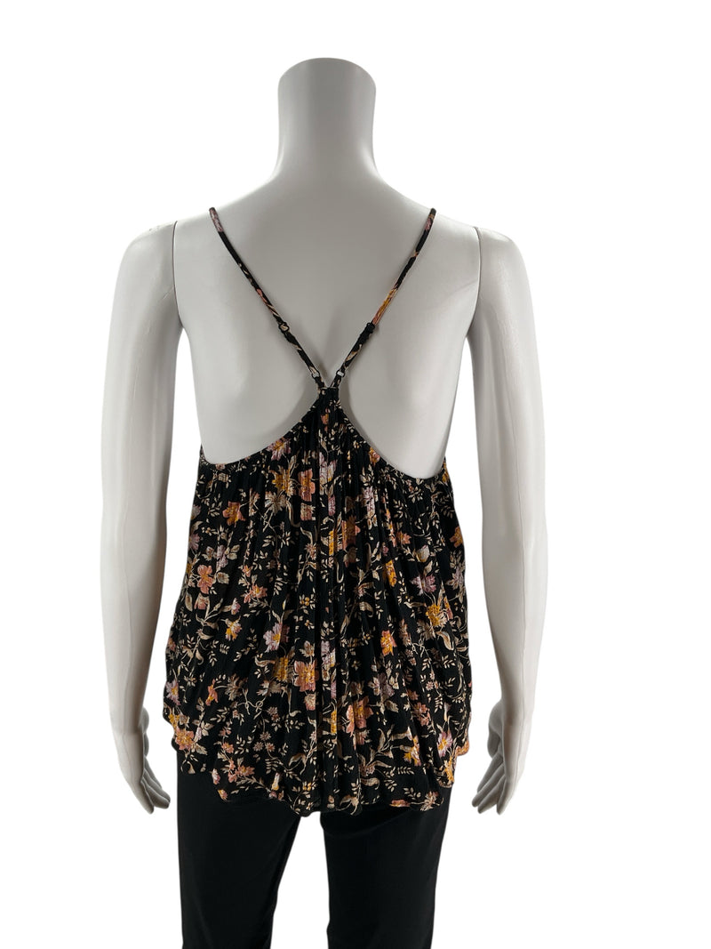 Back view of American Eagle floral racerback cami top in black and mustard, showing adjustable straps and loose fit on mannequin.
