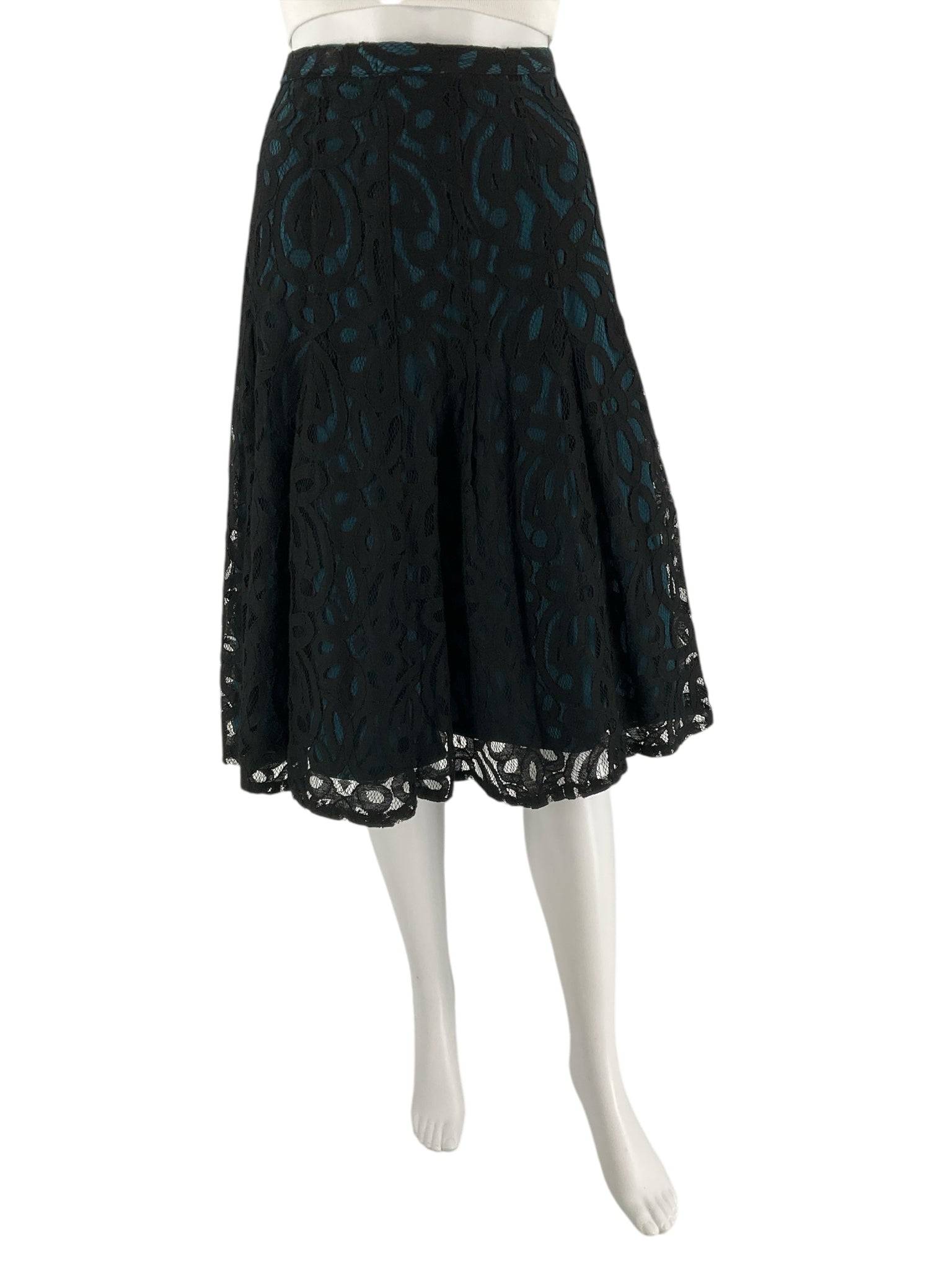 Front view of Coldwater Creek Skirt Size 8 Petite in black and turquoise lace, pre-owned and sold at Margaret's Fine Consignments.