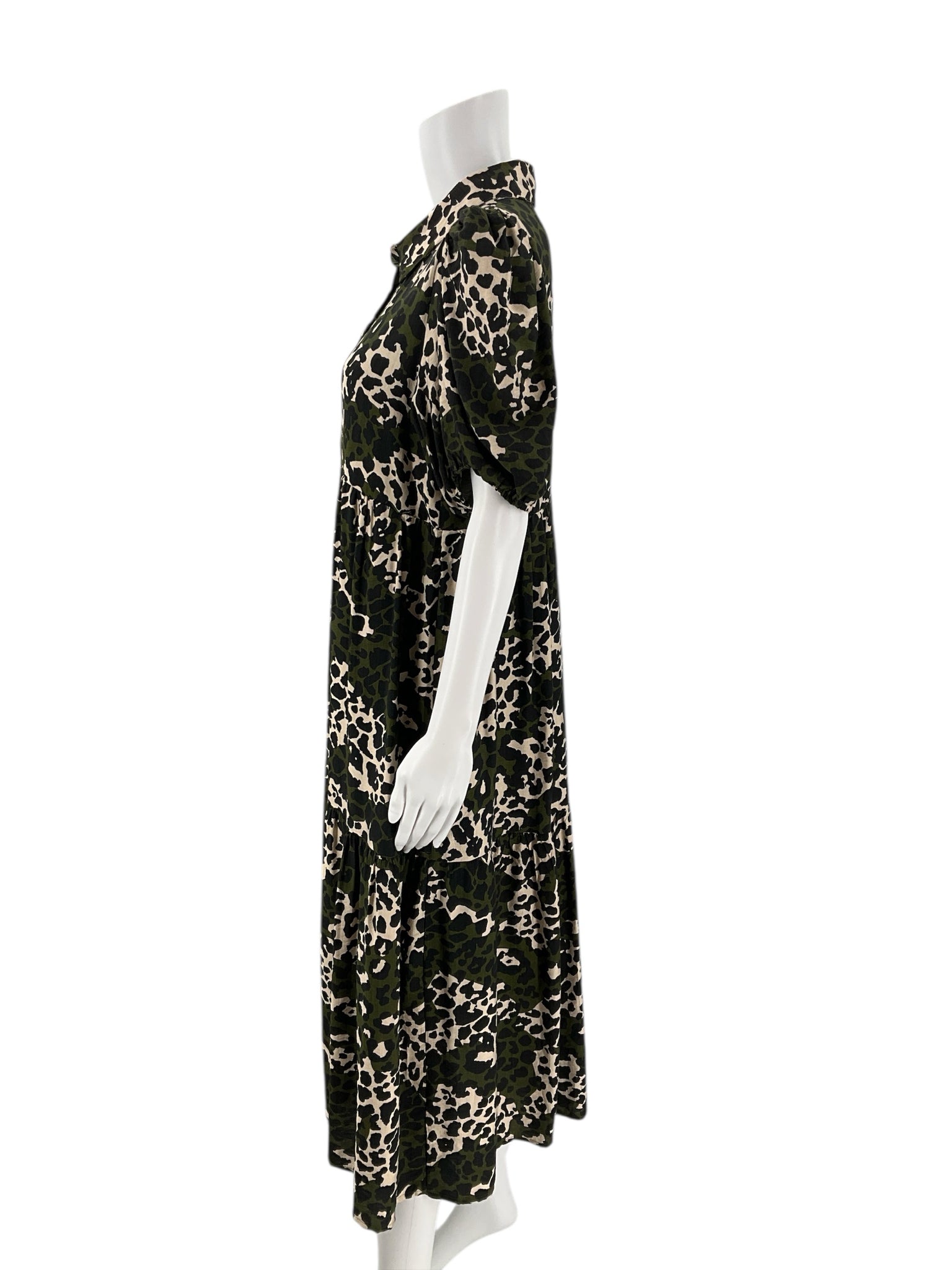Side profile of Tcec Olive/Black Animal Print Dress - Size Large showing relaxed fit and mid-length hem.