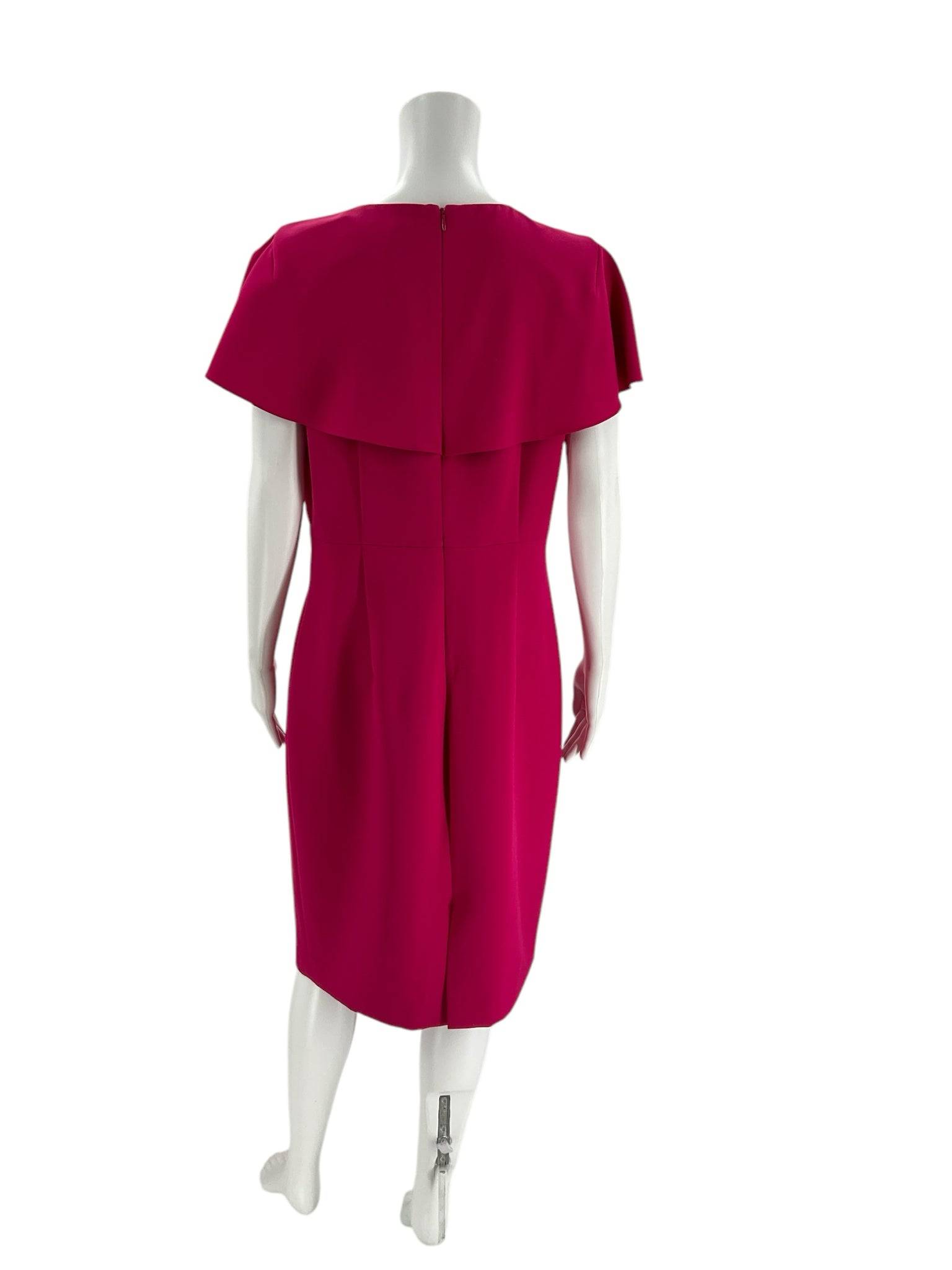 Back view of Alex Marie solid pink knee-length dress size 12 featuring a cape detail, sold by Margaret’s Fine Consignments.