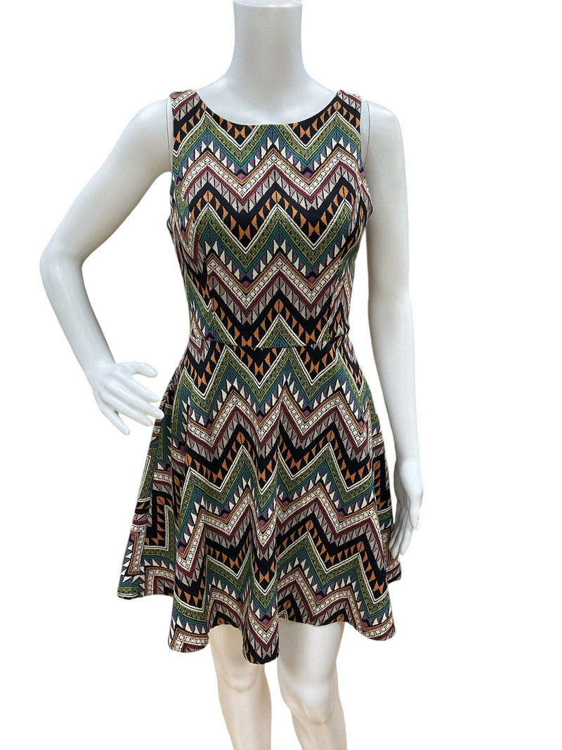 Close-up of Lush Navy/Multi Chevron Dress Size S showing detailed chevron print and sleeveless cut, sold at Margaret’s Consignment.