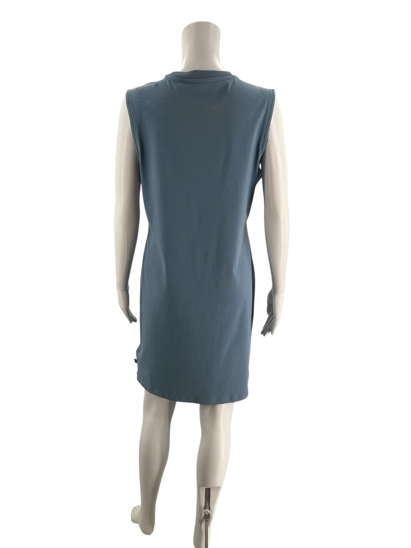Back view of Puma Essentials Blue Teal Logo Tank Dress on mannequin, showing sleeveless design and relaxed athletic fit.