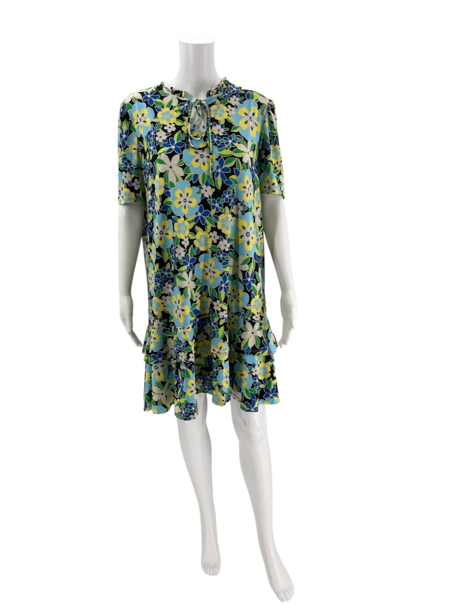 Carole Christian black and multi floral mini dress size large, displayed on mannequin, available at Margaret’s Fine Consignments.
