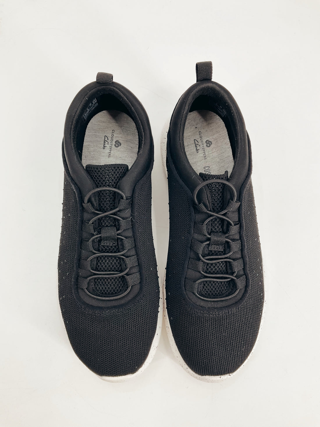 Top view of Clarks Black Rhinestone Pre-Owned Ladies Sneakers Size 8W showing lace-up design and cushioned insole, ideal for casual wear.