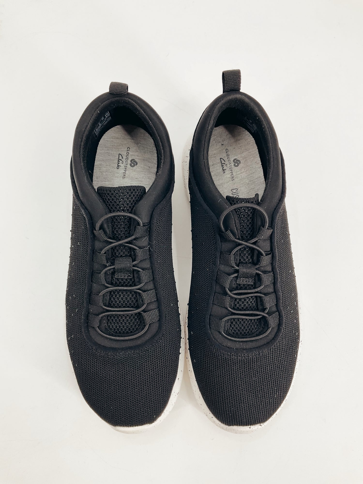 Top view of Clarks Black Rhinestone Pre-Owned Ladies Sneakers Size 8W showing lace-up design and cushioned insole, ideal for casual wear.