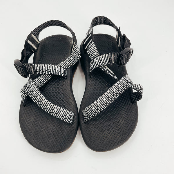 Top view of Chaco Black/White Print Pre-Owned Ladies Sandals - Size 6 with strappy design, ChacoGrip sole, and LUVSEAT footbed for hiking support.
