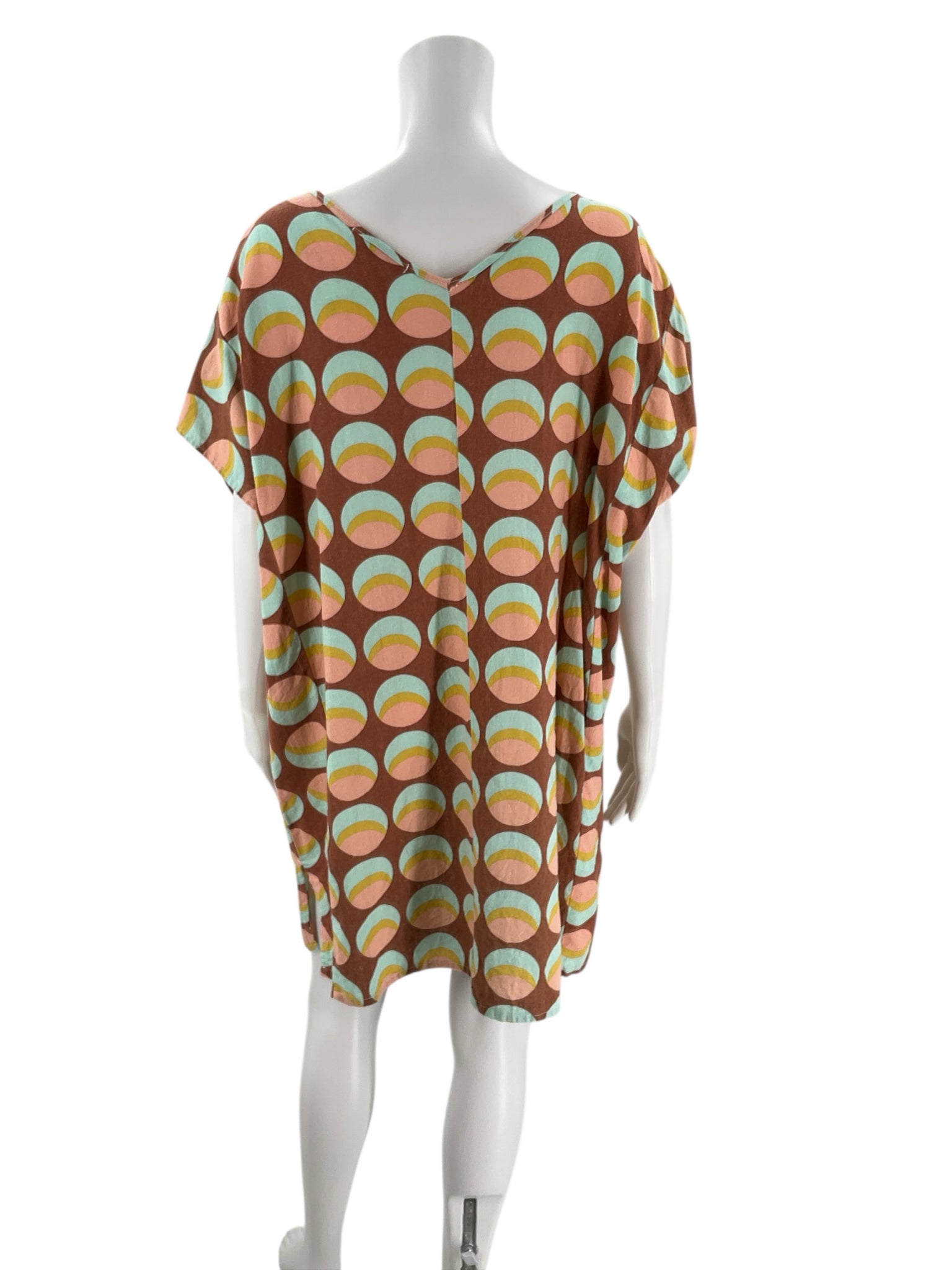 Back view of Becasa Rust/Multi Circles Print Dress - Size XS, featuring colorful circular pattern and loose silhouette. Pre-owned at Margaret’s.