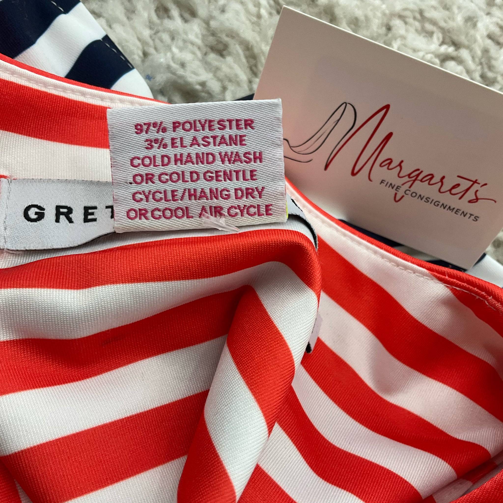Fabric care label of Gretchen Scott Navy & White Stripe Dress – Size Medium, showing 97% polyester and 3% elastane blend.