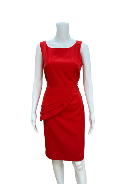 Front view of Venus Red Solid Pre-Owned Ladies Dress - Size 10 on mannequin, showcasing sheath silhouette and layered ruffle accent on the hip.