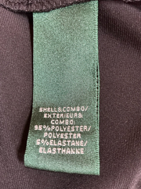 Close-up of fabric content tag showing 95% polyester and 5% elastane blend for Ralph Lauren Black/White Animal Print Dress.